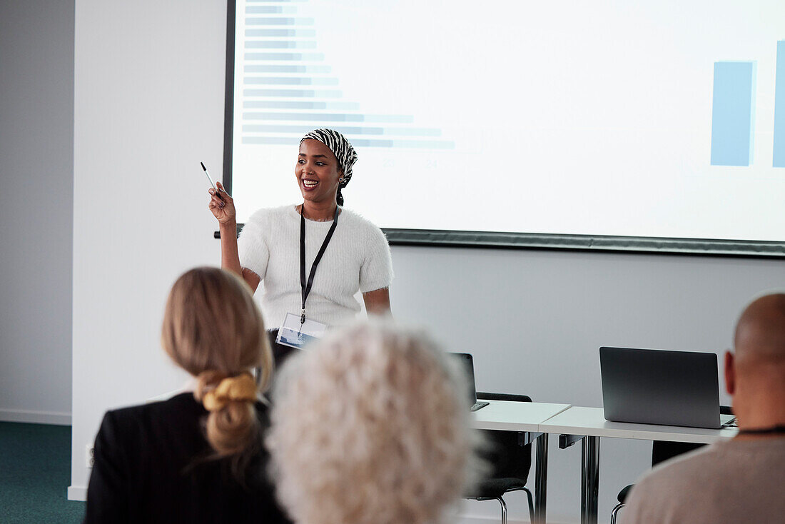 Woman having presentation during business meeting