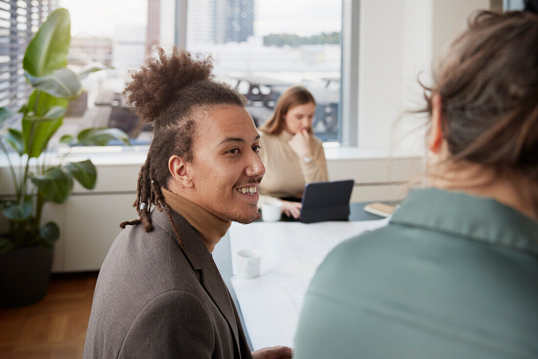 Smiling man in office