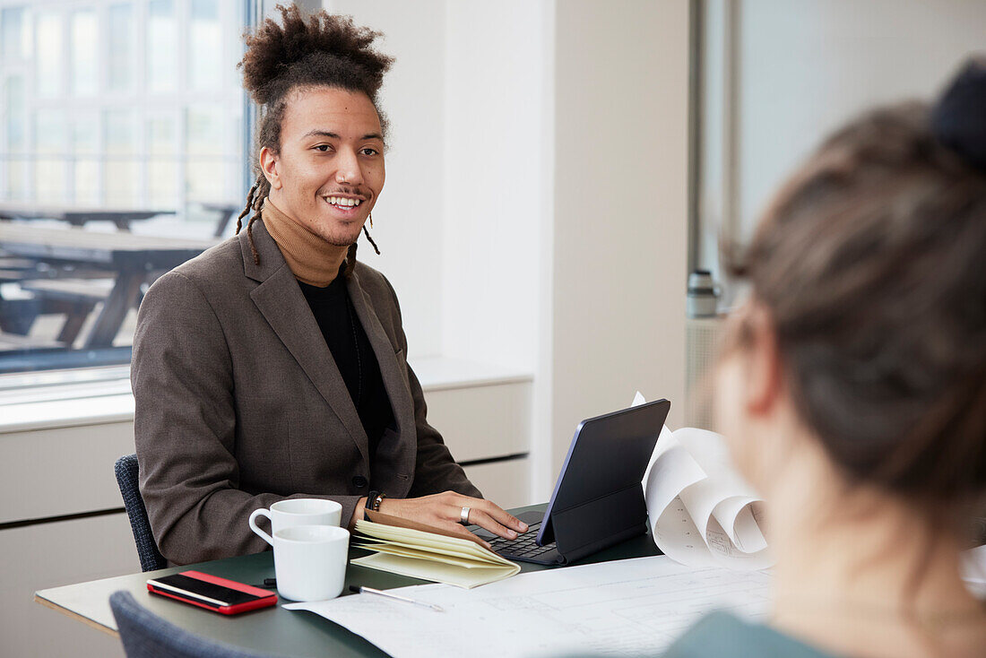 Smiling man in office