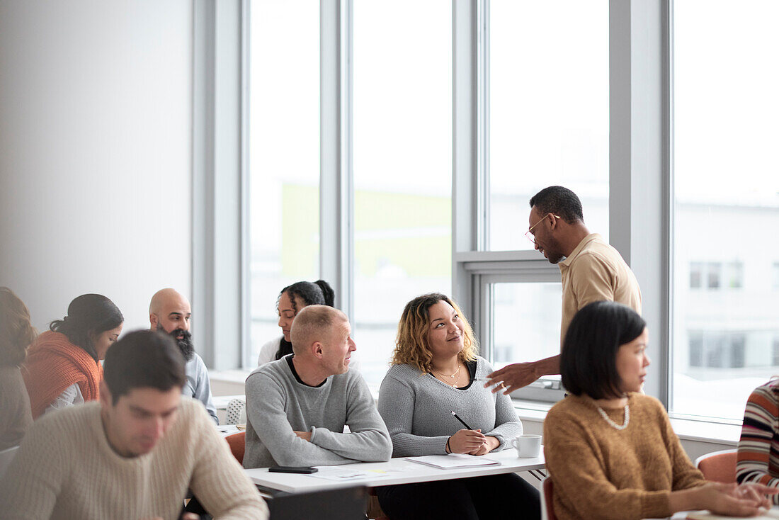 Teacher and adult students in class