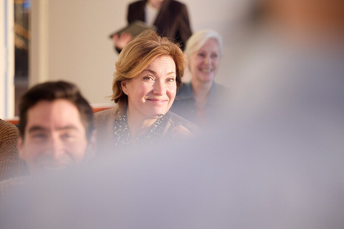 Smiling woman at workshop