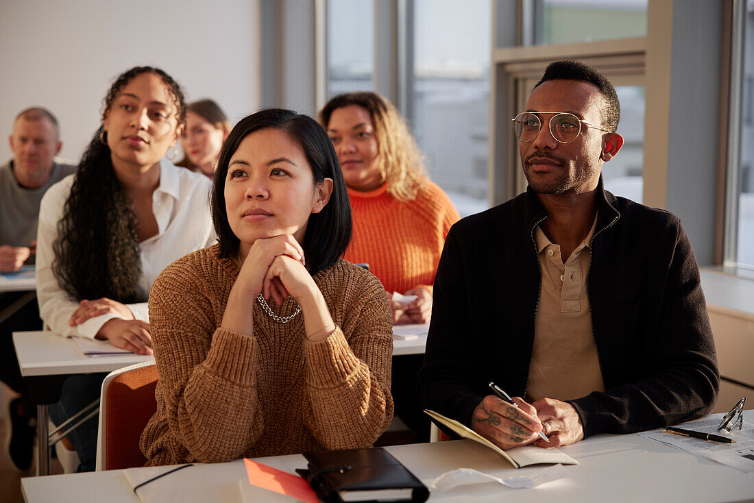 Group of adults sitting in class