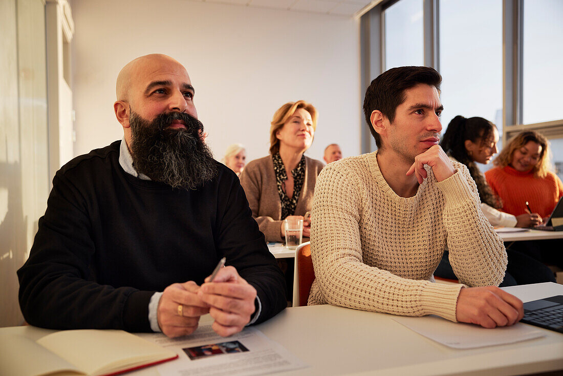 Group of adults sitting in class