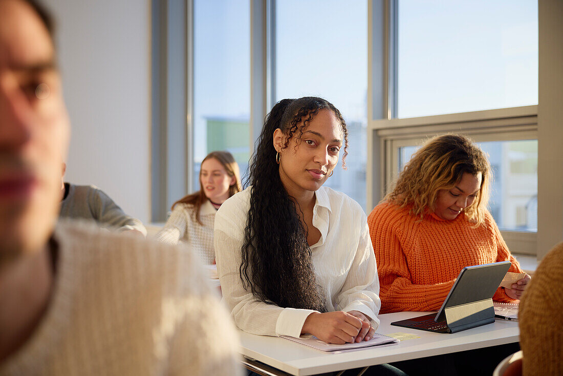 Portrait of smiling woman in class