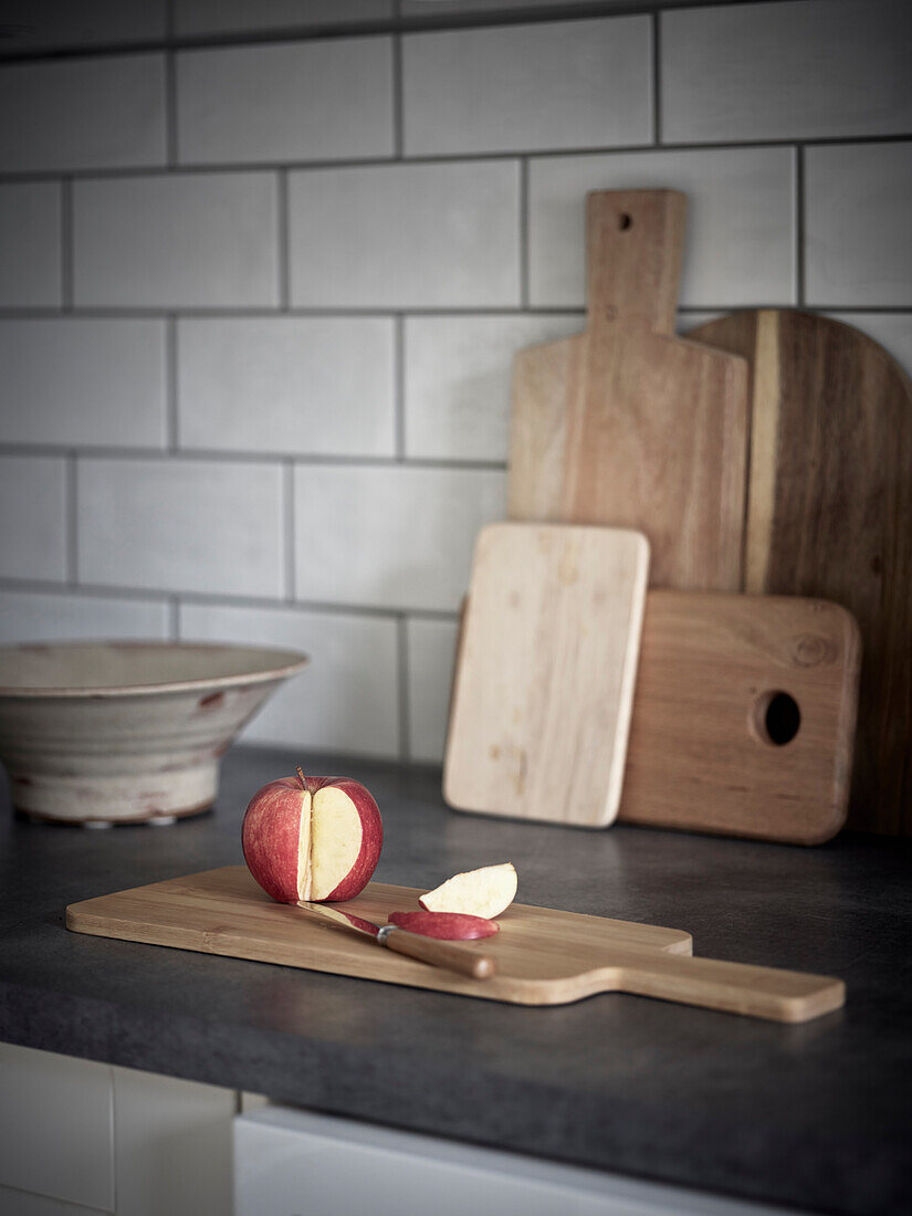 Apple on wooden board