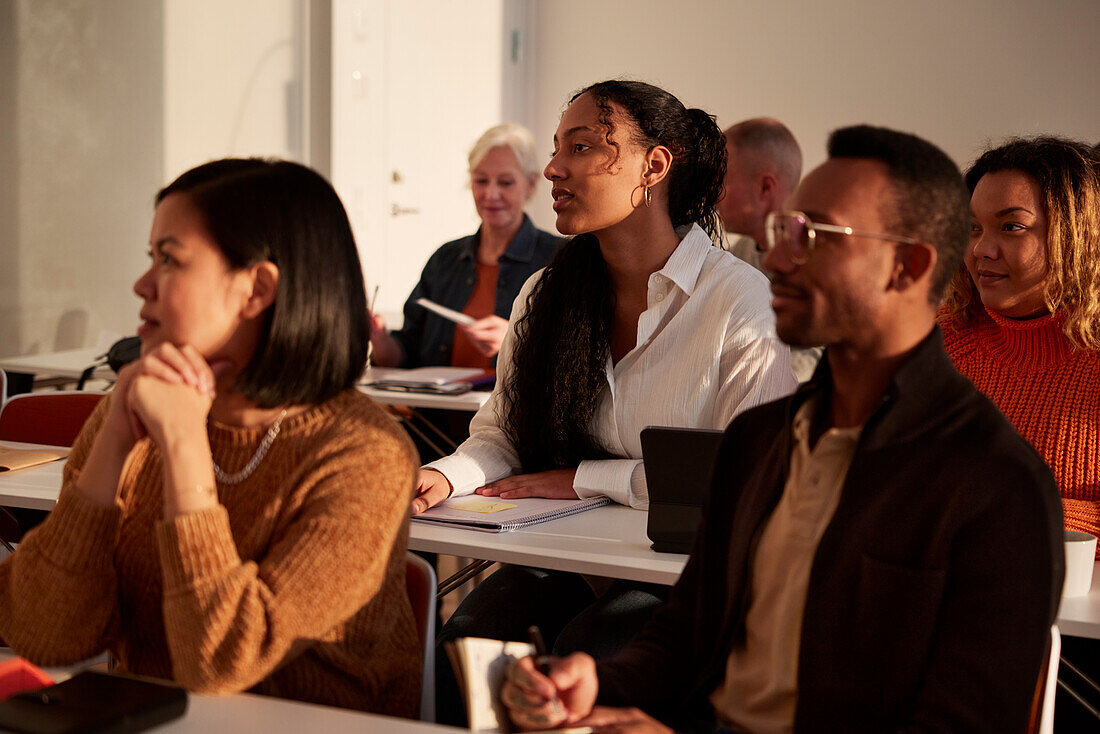 Group of adults sitting in class