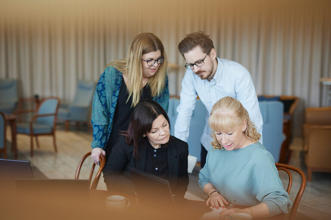 People talking during business meeting