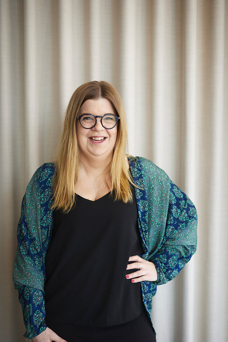 Smiling businesswoman looking at camera