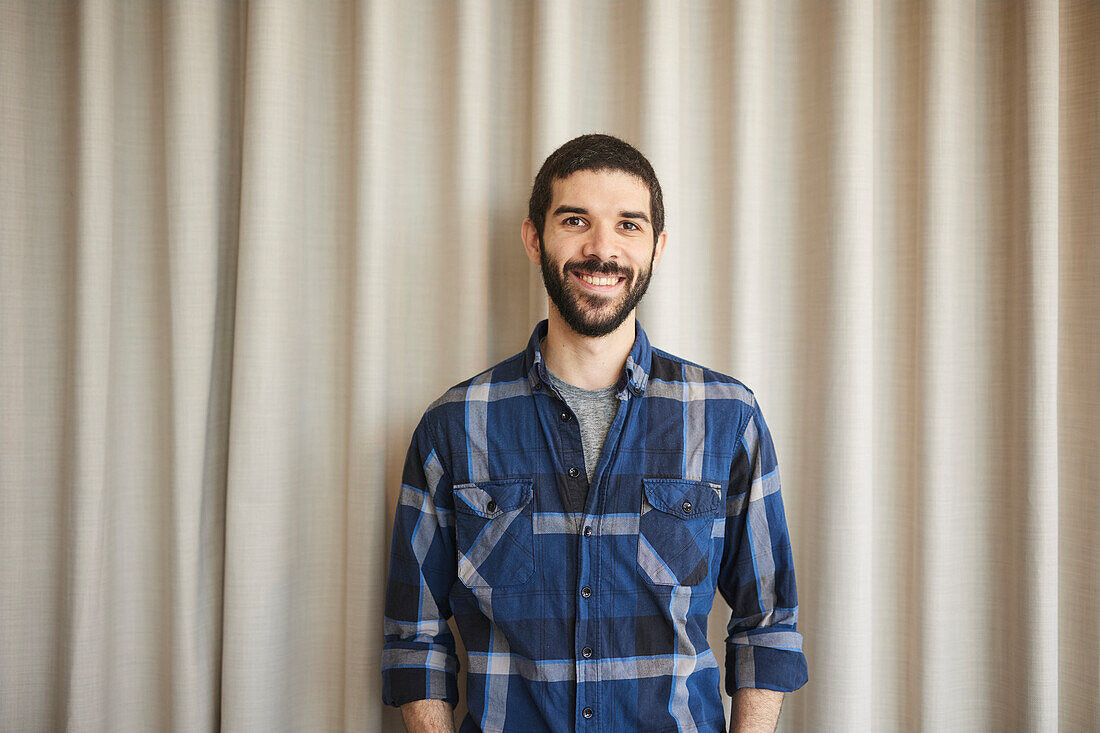 Smiling man looking at camera