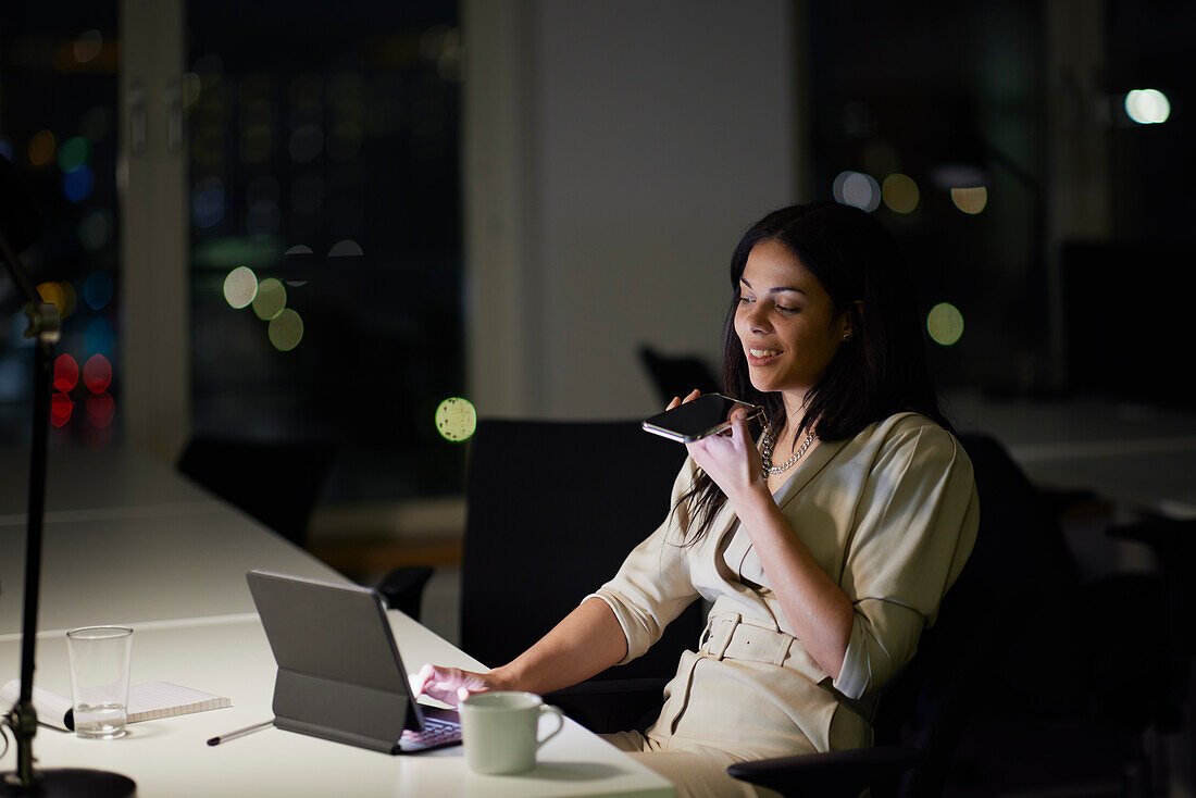 Woman working late in office