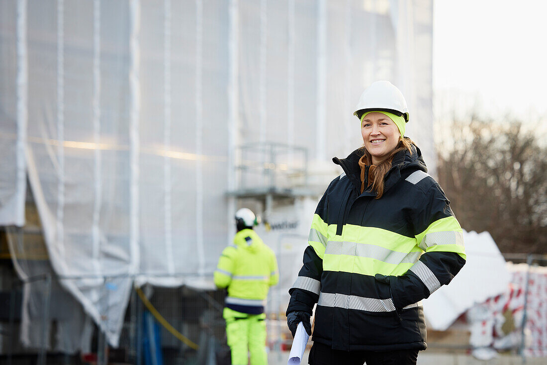 Female engineer at building site