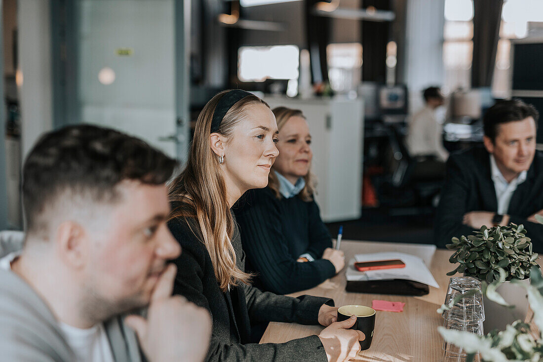 Smiling woman during business meeting