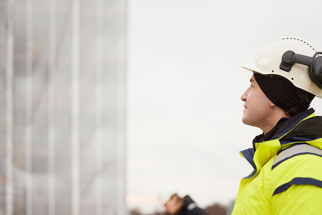 Engineer standing at building site