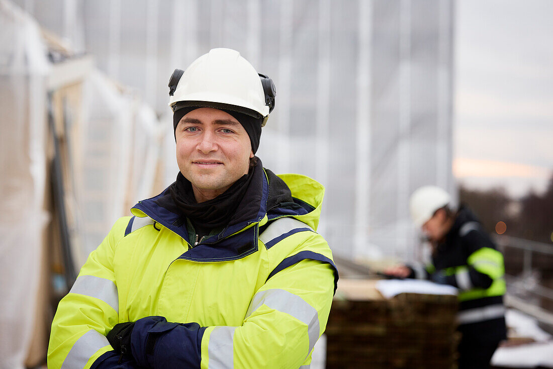 Engineer standing at building site