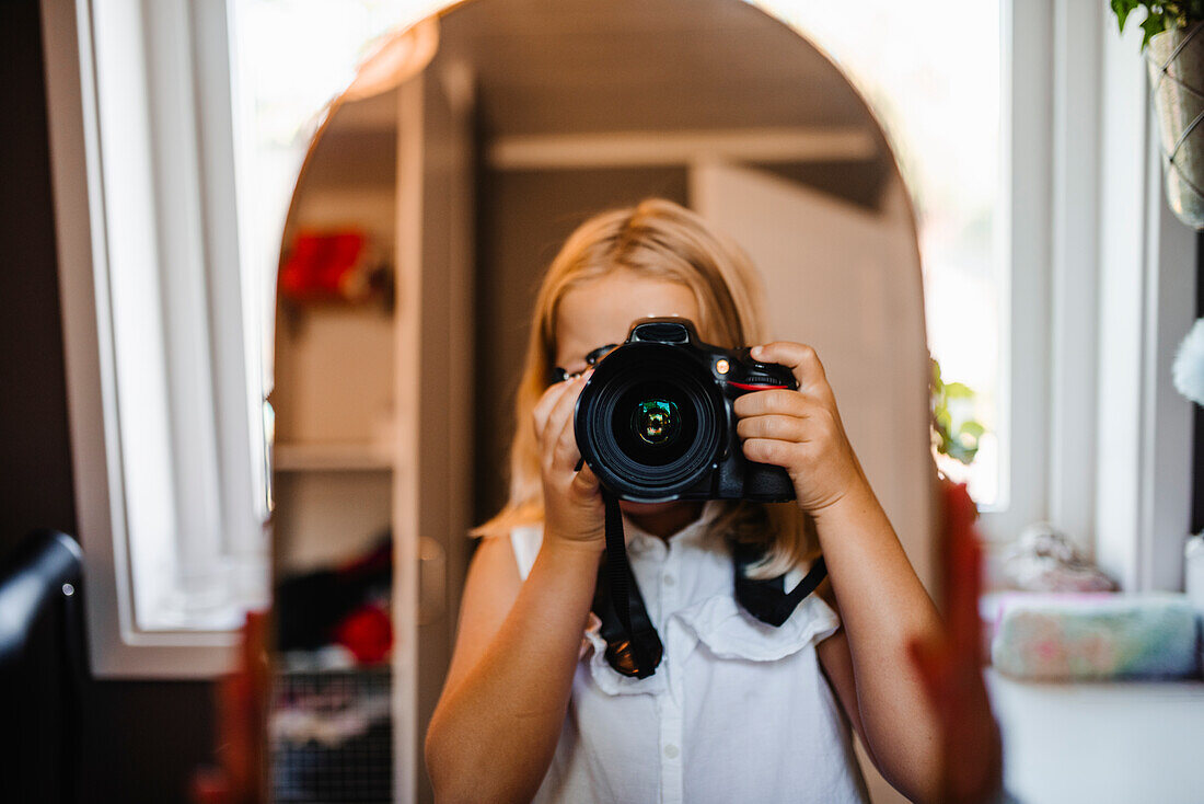 View of girl taking photo