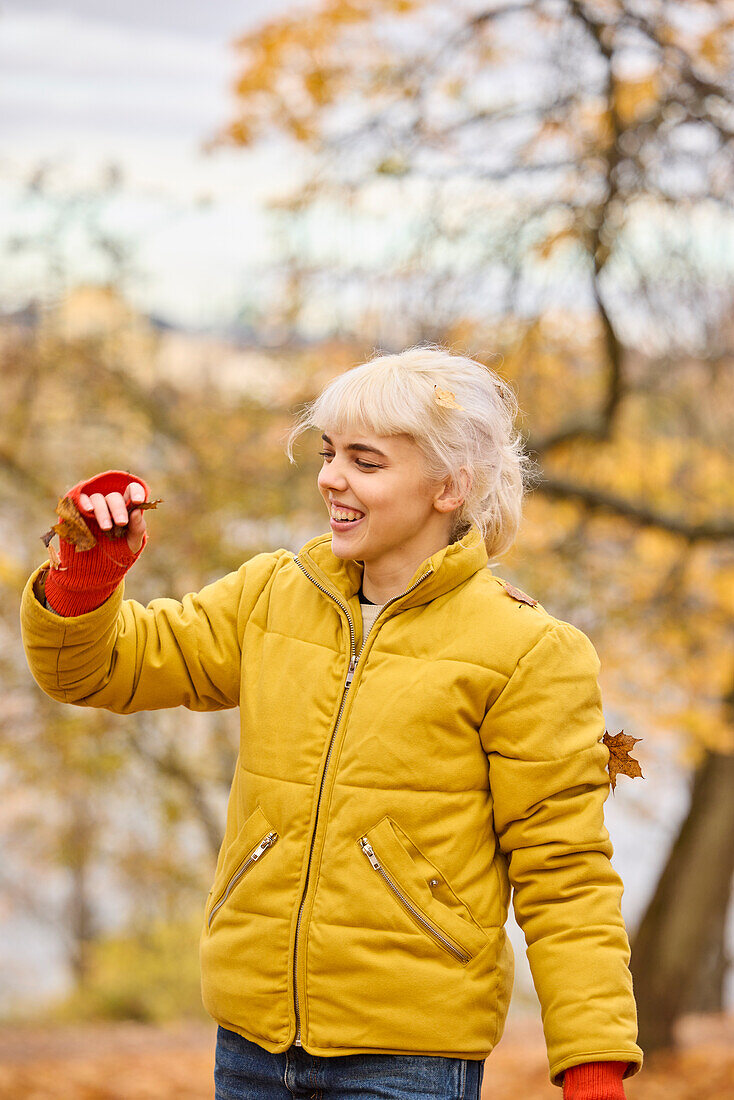 Smiling young woman looking away