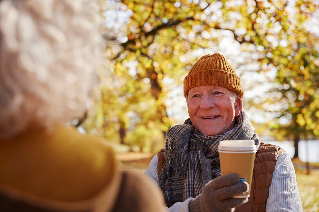 Senior man holding coffee cup