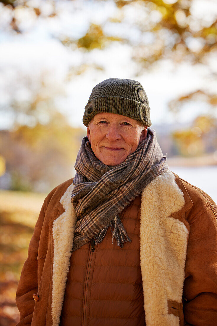 Smiling senior man looking at camera