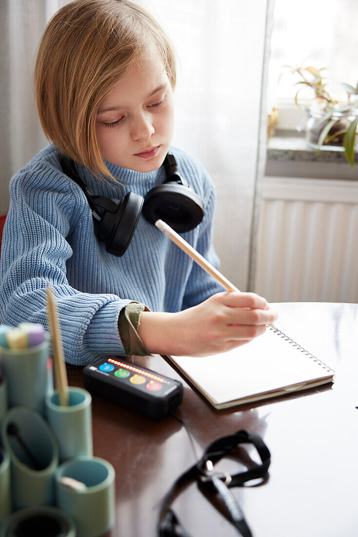 Girl doing homework at home