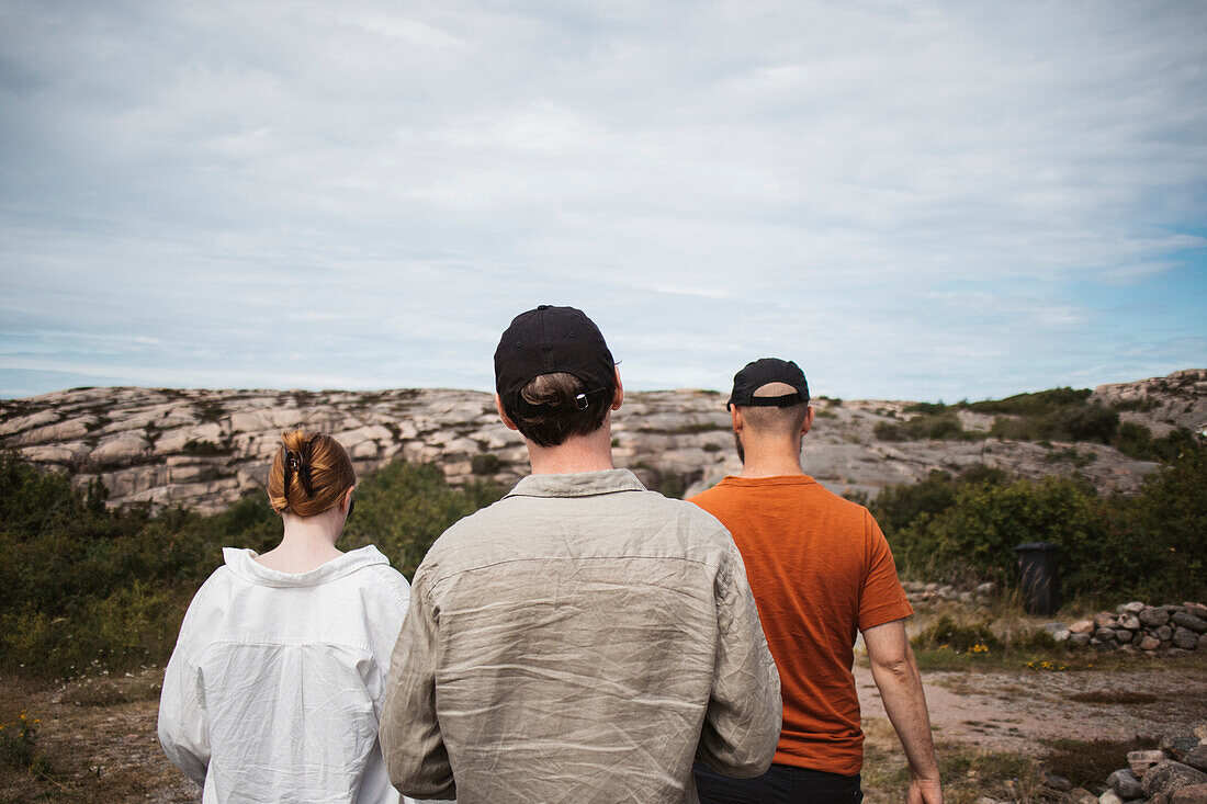 Rear view of people walking together