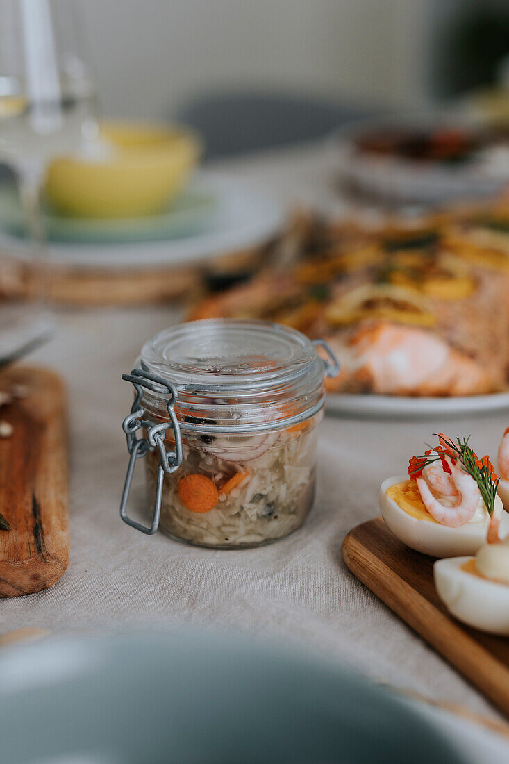 Close-up of herrings in jar for Easter meal