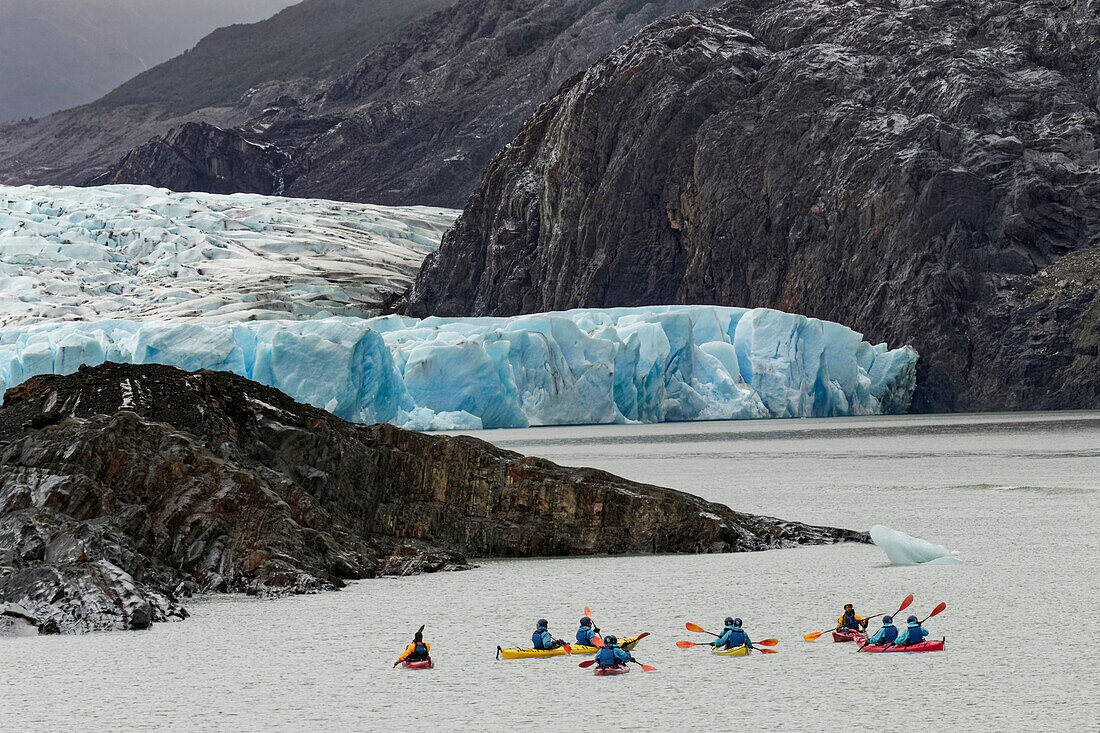 Kayaker's exploring Grey Lake and Grey Glacier, Torres del Paine National Park, Chile. Patagonia