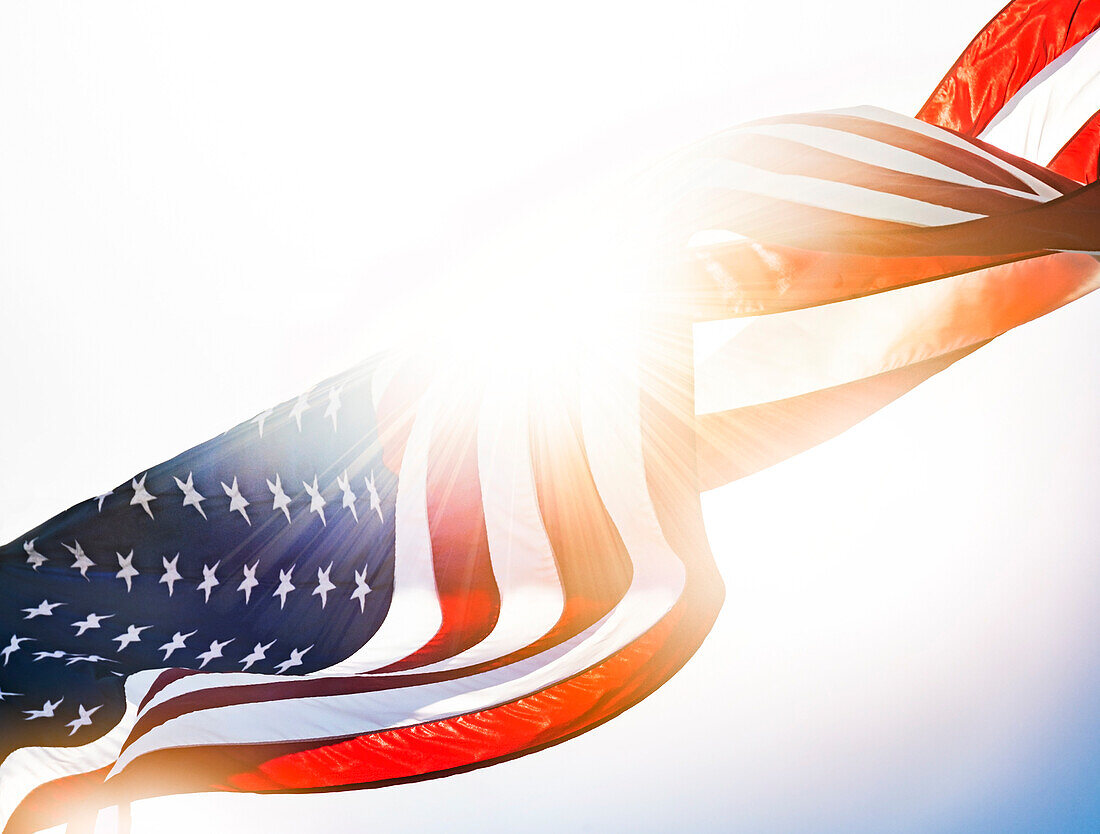 American flag against sunlight