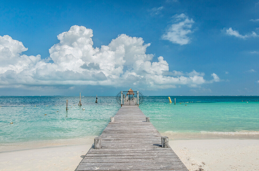 Mexico, Cancun. Wooden Pier in the Ocean