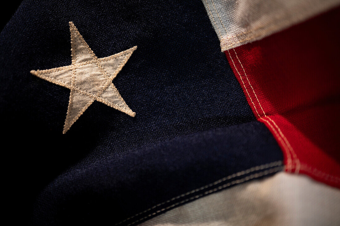 Close-up of star on retro American flag