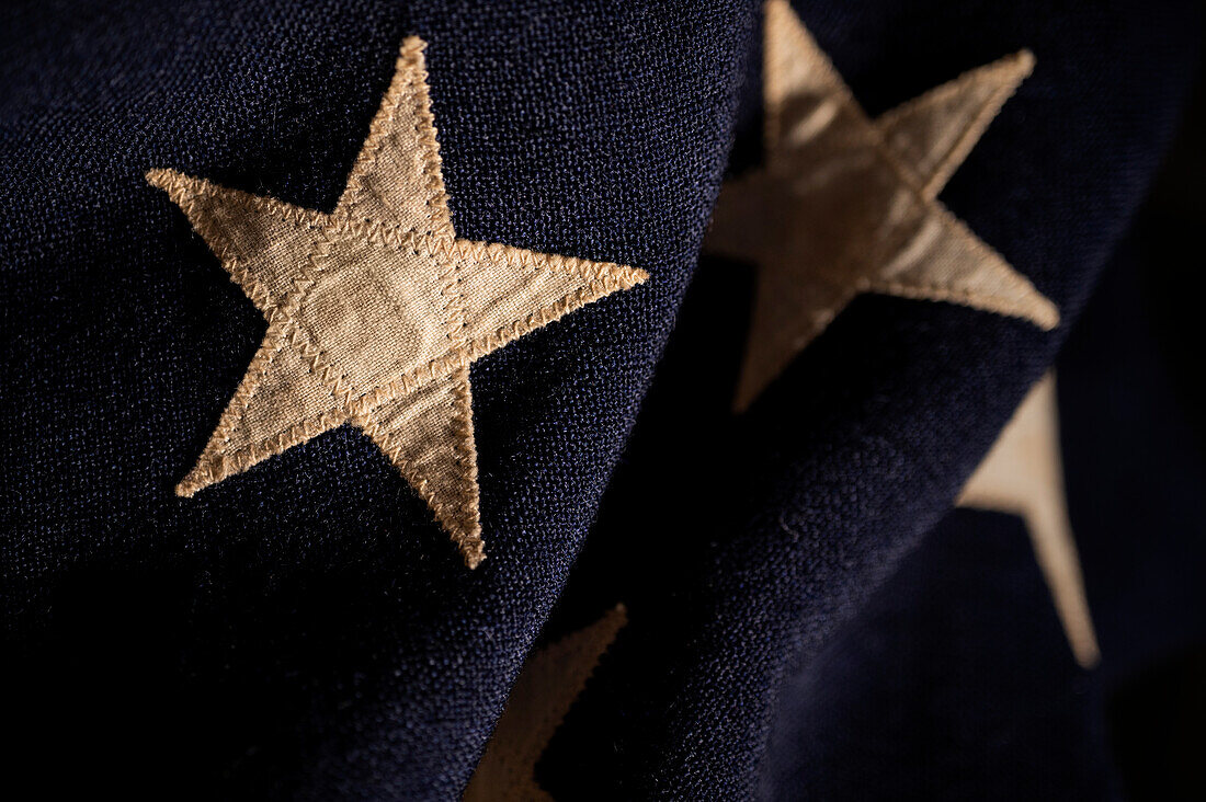 Close-up of stars on retro American flag