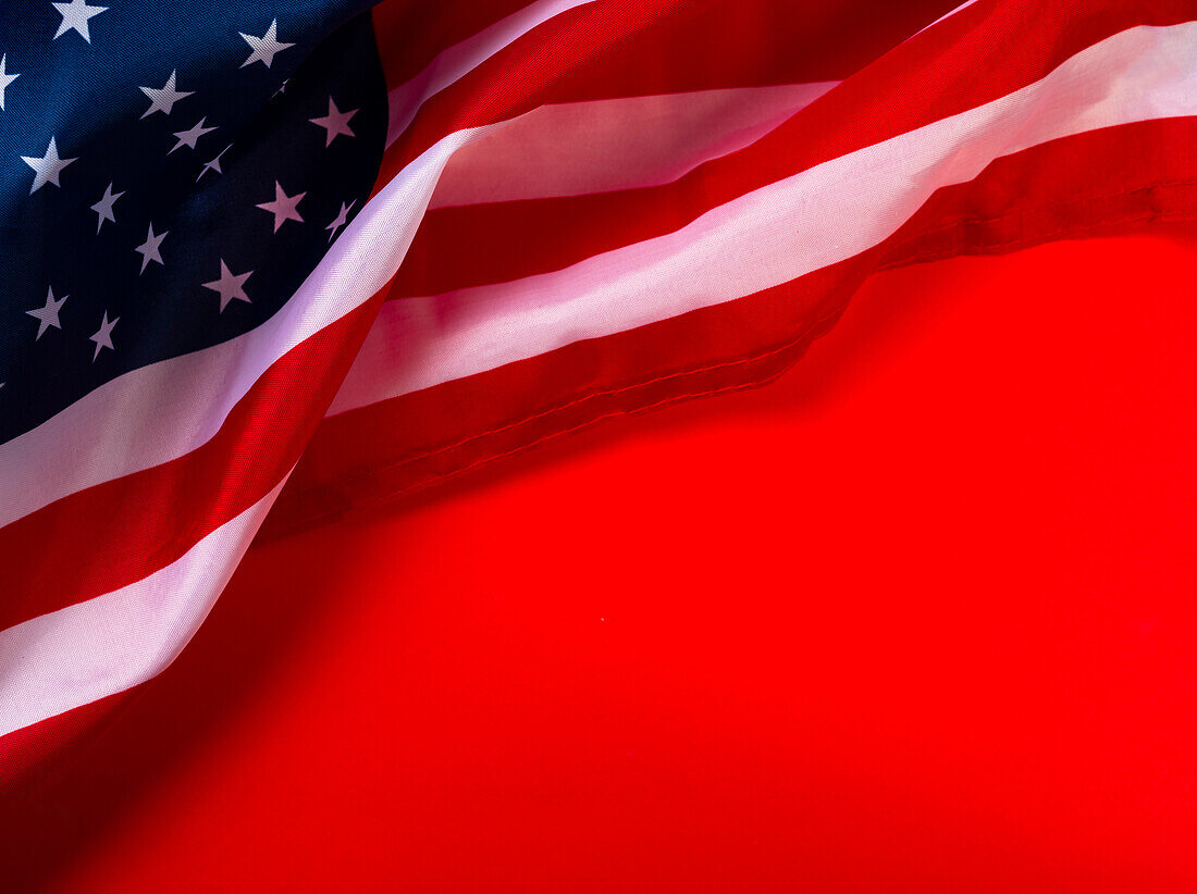 American flag against red background