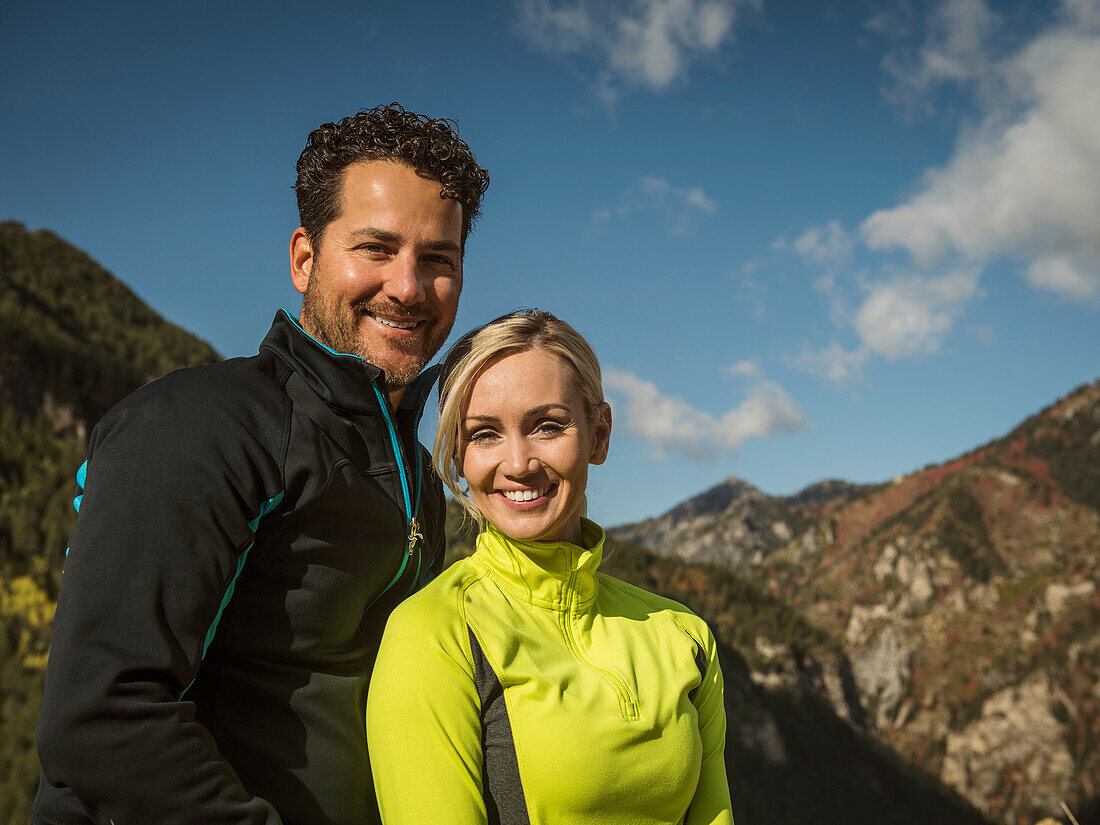 United States, Utah, American Fork, Portrait of smiling couple in mountain landscape