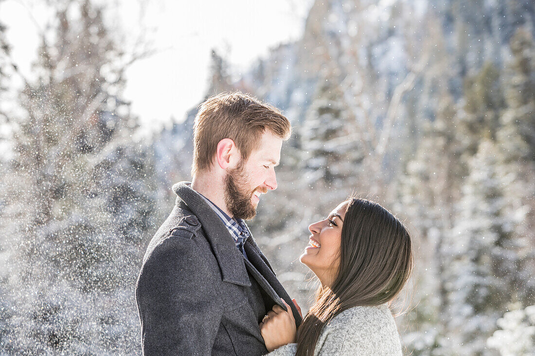 United States, Utah, American Fork, Smiling couple face to face in Winter landscape