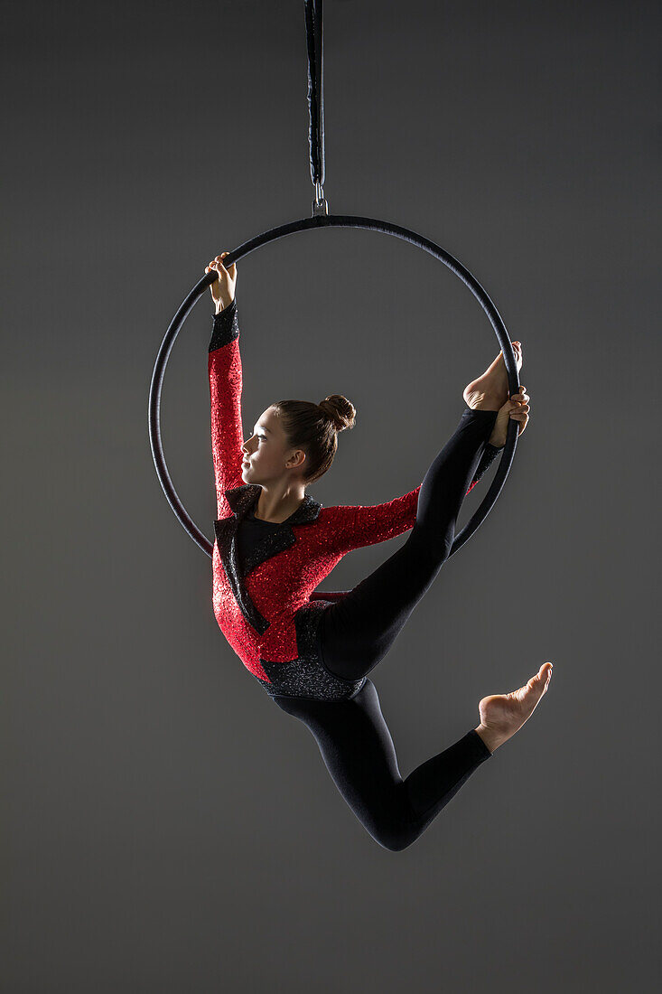 Teenage girl (14-15) performing aerial dance 