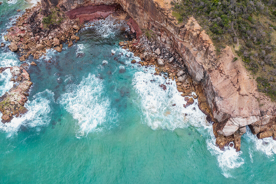 Australia, New South Wales, Port Macquarie, Aerial view of cliff and sea 