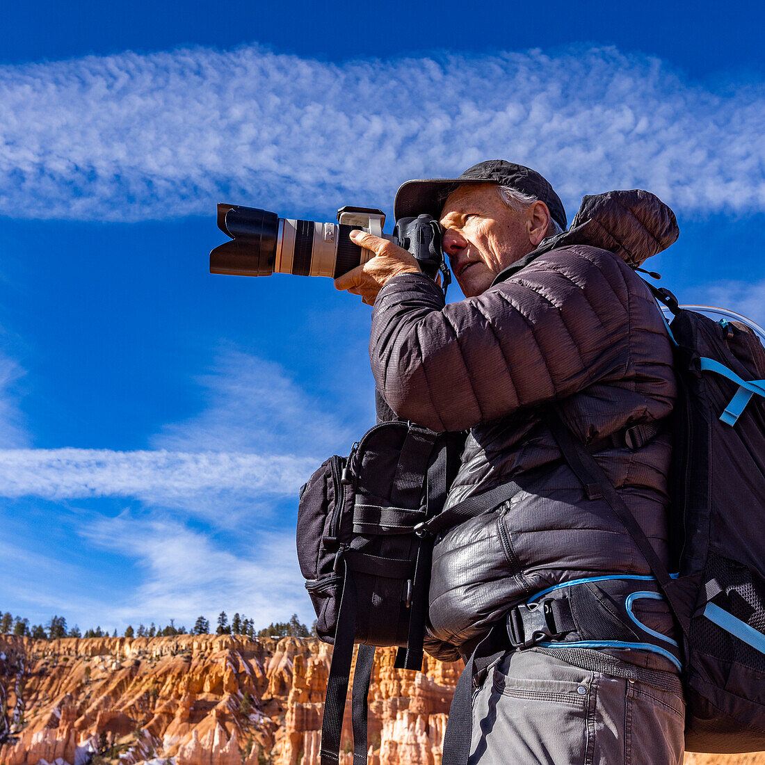 United States, Utah, Senior photographer photographing in Zion National Park