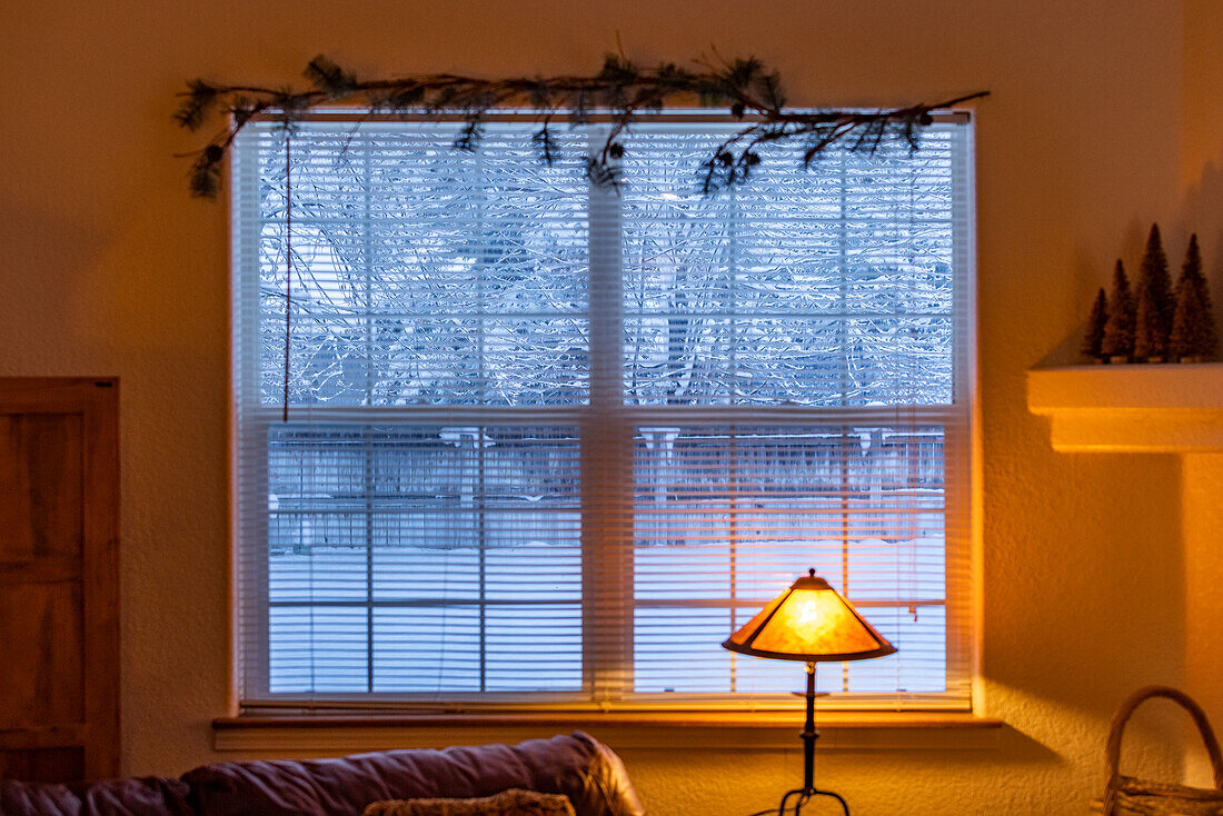 View from living room to snowy outdoors