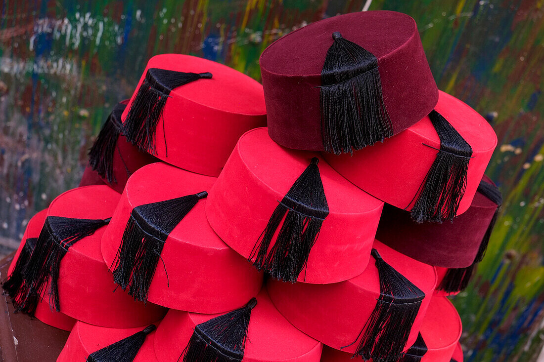 Traditional red Fez hats piled up for sale