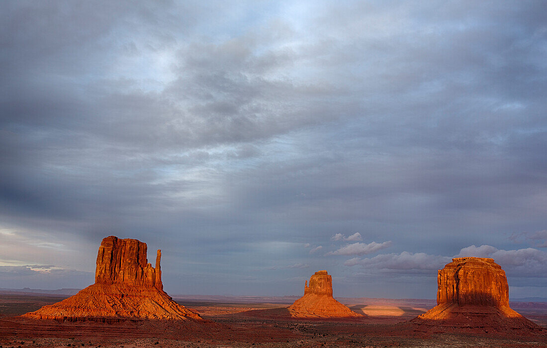 Arizona, Monument Valley, West Mitten, East Mitten and Merrick Butte, sunset