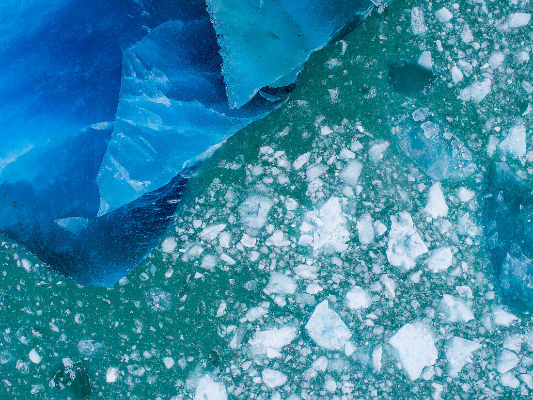 USA, Alaska, Aerial view of shattered icebergs floating near calving face of LeConte Glacier east of Petersburg