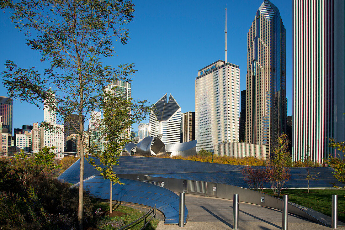 BP Bridge in Millennium Park in Chicago, early morning in autumn, with skyline