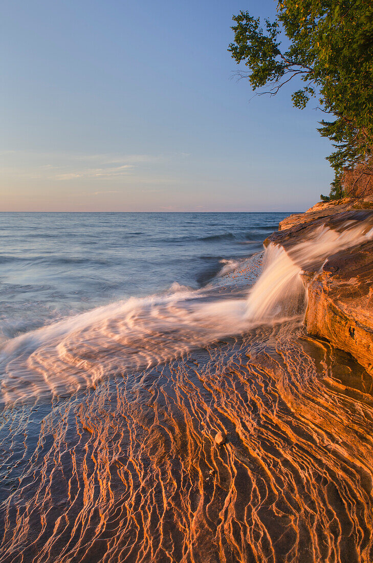Elliot Falls flowing over layers of Au Train Formation sandstone at Miners Beach. Pictured Rocks National Lakeshore, Michigan