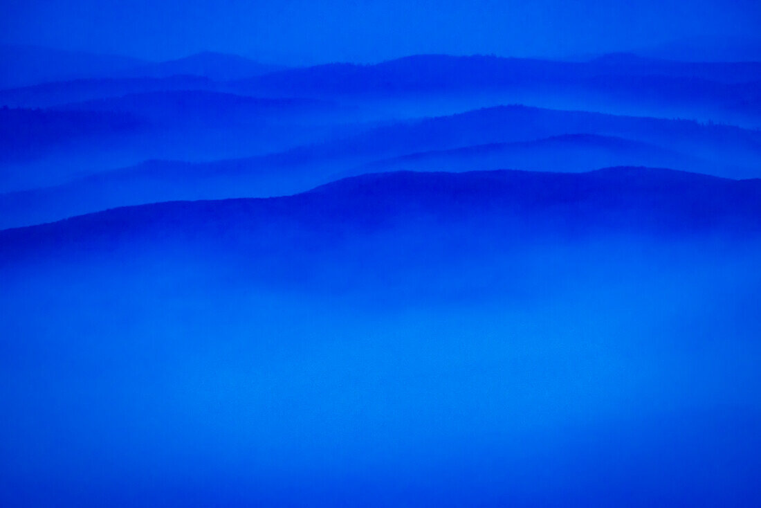 Wildfire smoke and clouds mixing, Stillwater State Forest near Whitefish, Montana, USA