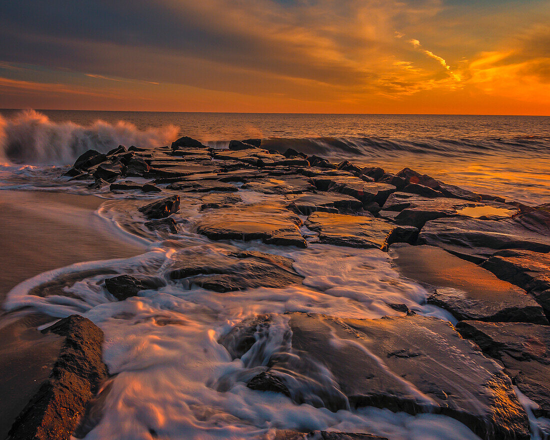 USA, New Jersey, Cape May National Seashore. Sunset on ocean shore