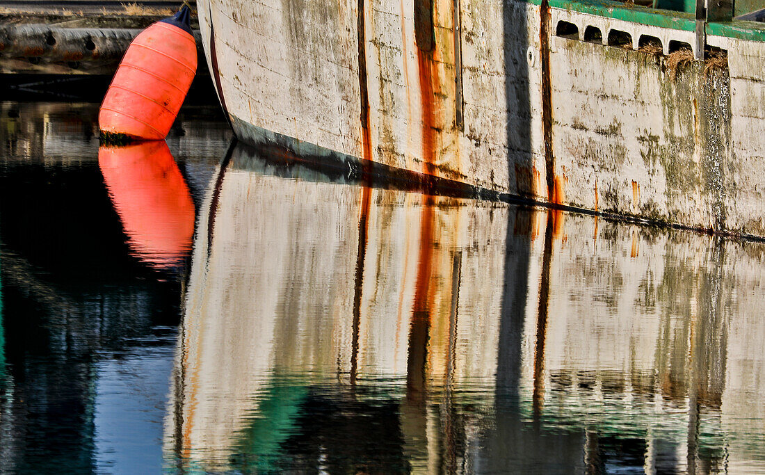 Fishing boat colors reflected in Charleston Marina, Oregon