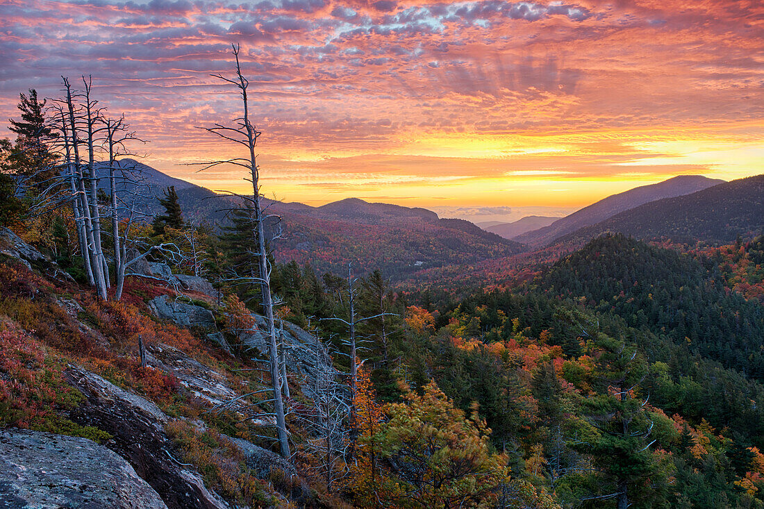 USA, New York State. Sunrise on Mount Baxter in autumn, Adirondack Mountains.