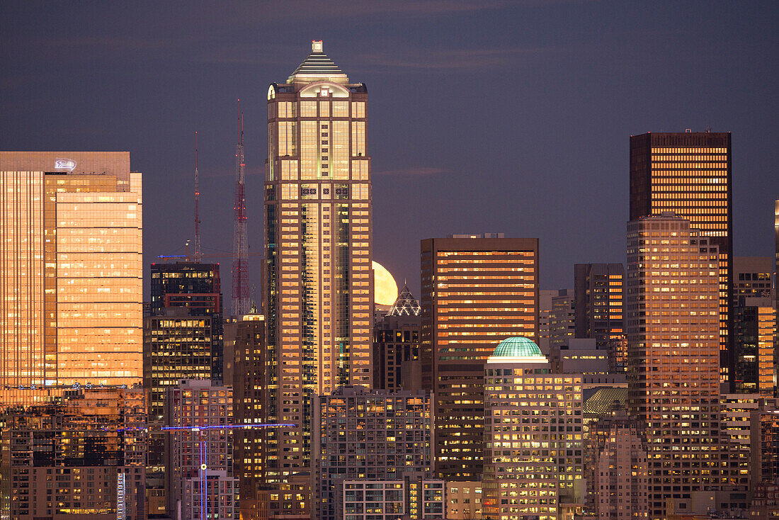 Moonrise behind the downtown Seattle skyline, Seattle, WA