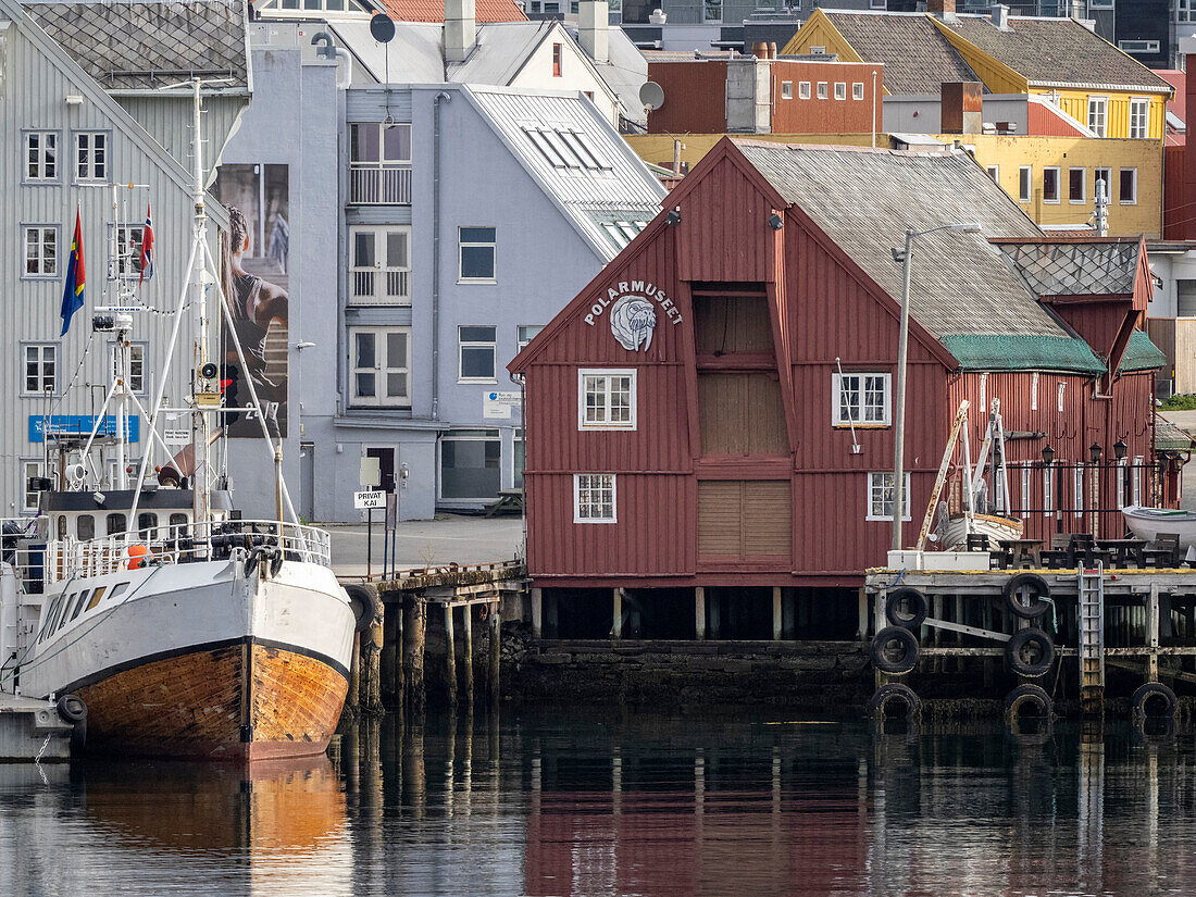 A view of the water front in the city of Tromso, located 217 miles north of the Arctic Circle, Tromso, Norway, Scandinavia, Europe