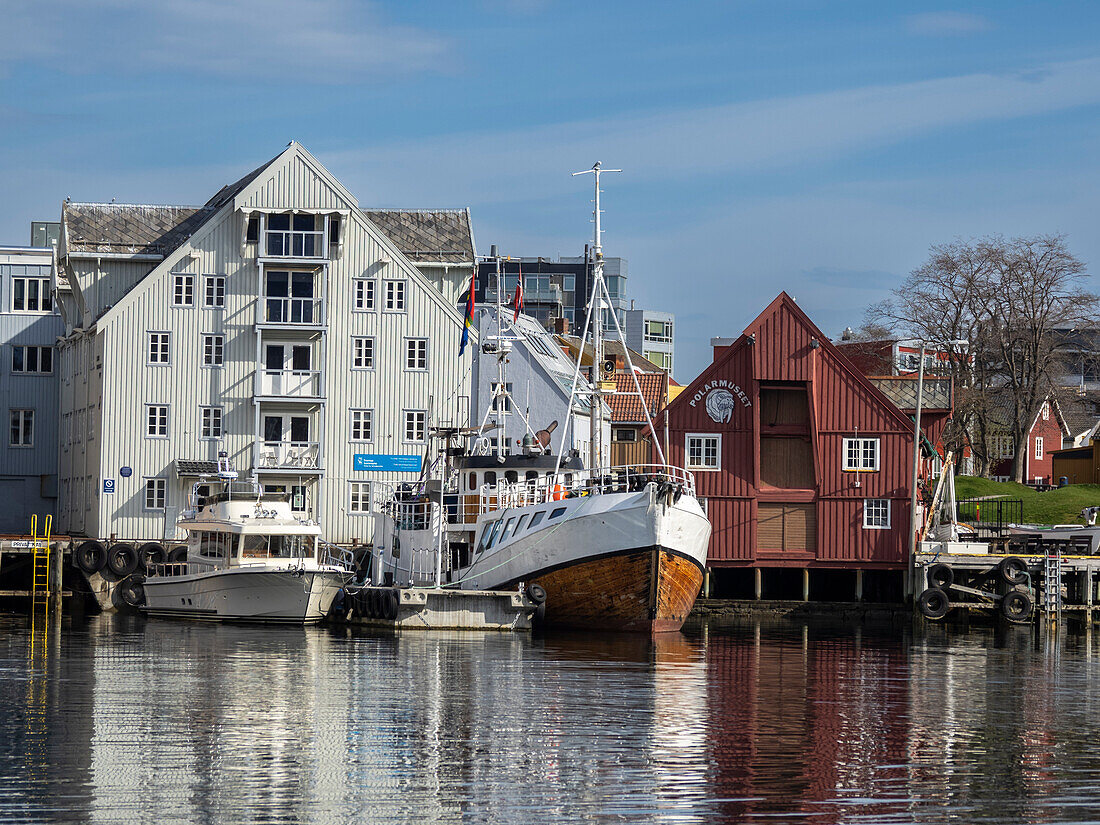 A view of the water front in the city of Tromso, located 217 miles north of the Arctic Circle, Tromso, Norway, Scandinavia, Europe