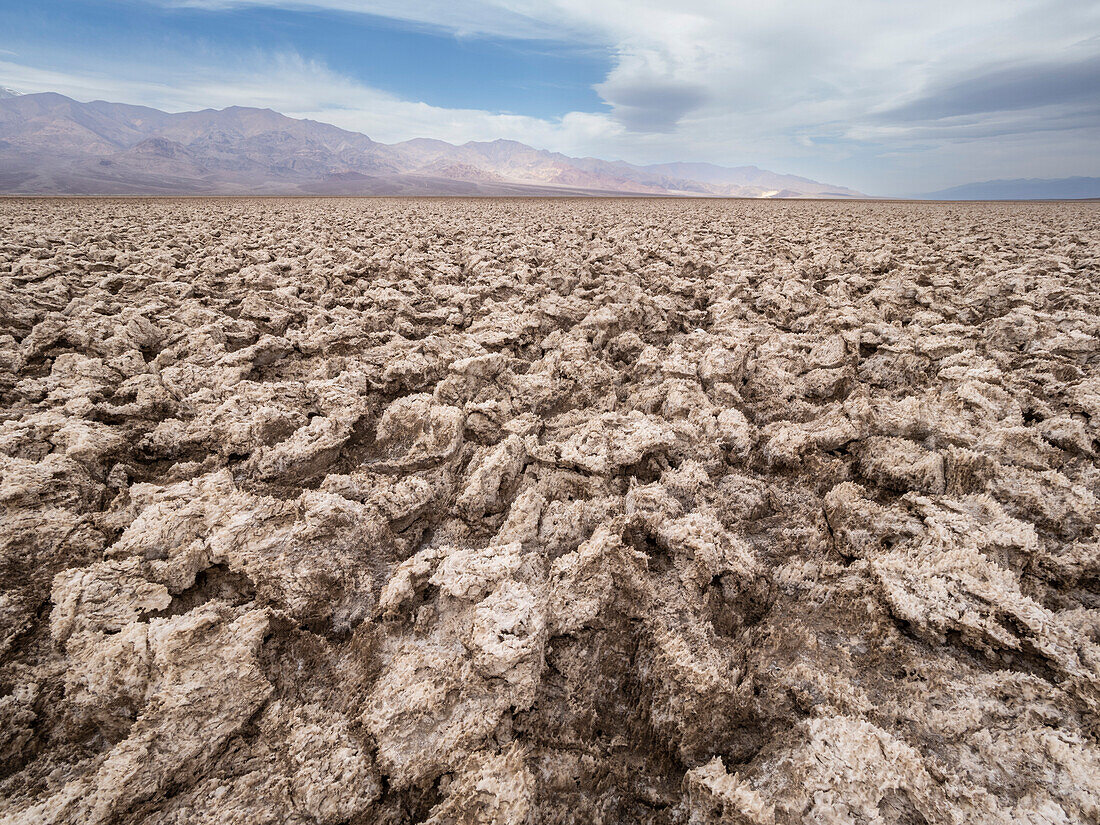 The Devil's Golf Course, a large salt pan filled with halite salt crystal, Death Valley National Park, California, United States of America, North America